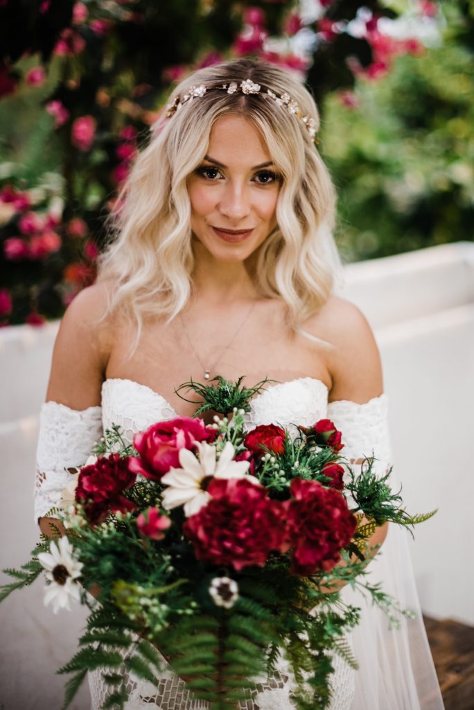 Bride holds wedding bouquet 