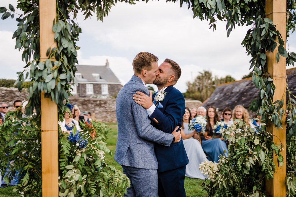 Grooms kiss as they are announced as Mr and Mr.