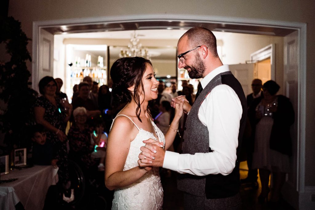 bride and groom share their first dance as newlyweds.