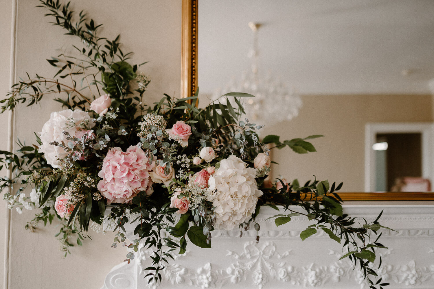 Stunning mantel floral arrangement at Kingston Estate country house.