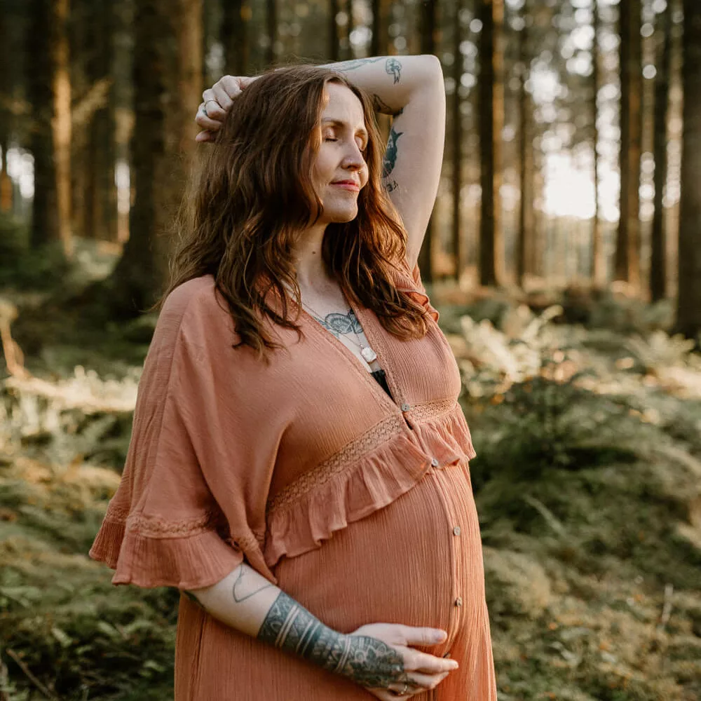Expectant mother in woodland during Maternity Photography Session.